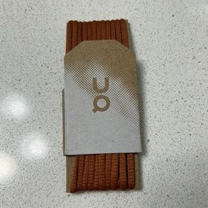 On Cloud Laces in Russet